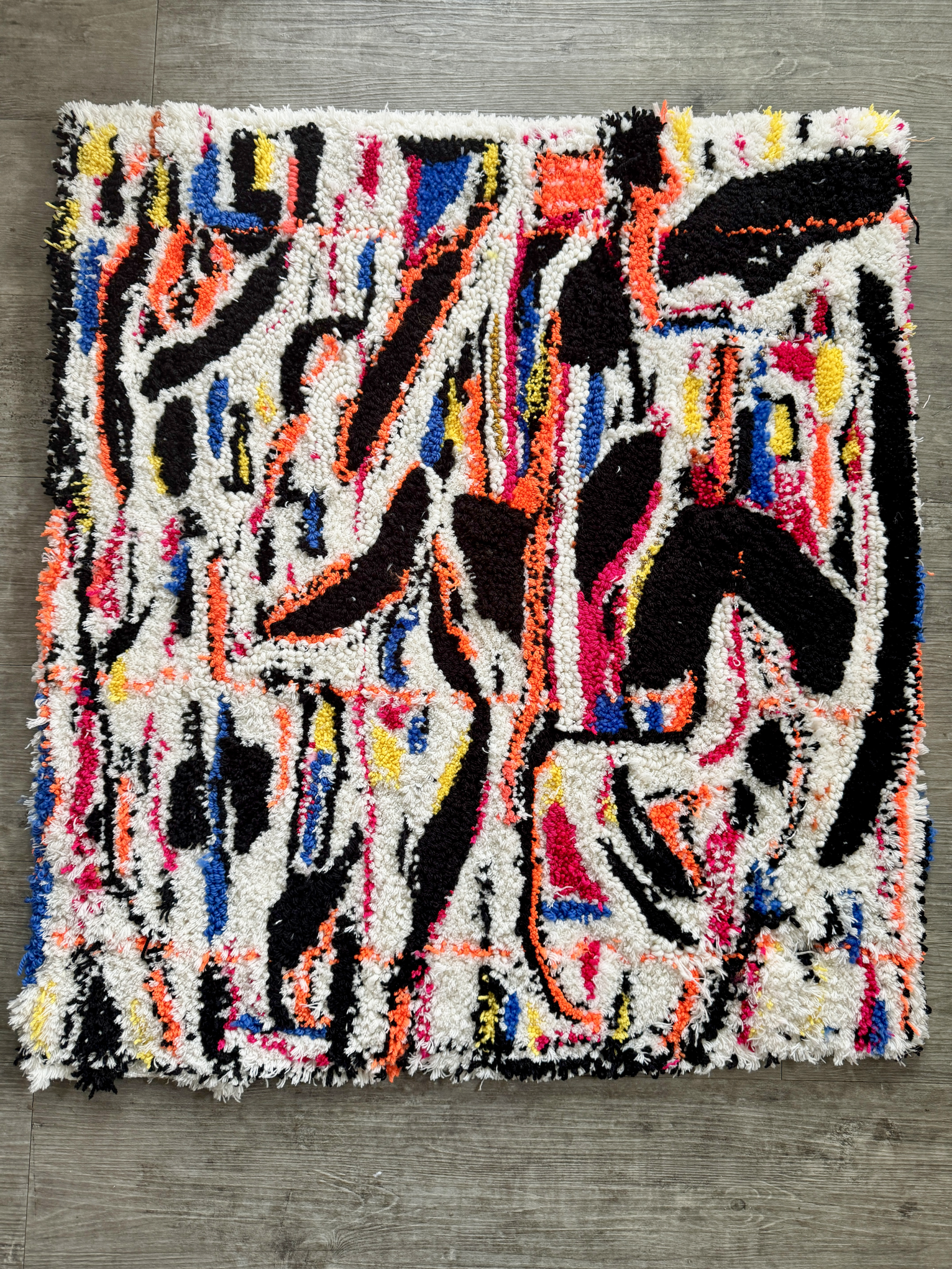 Big Feelings II tufted abstract wall hanging by Natalie Lue